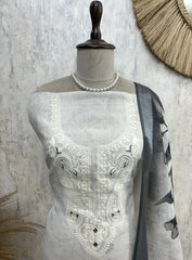 Linen Unstitched Suit Set With Embroidered Neckline & Printed Hem