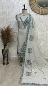 Cotton Unstitched Suit Set With Floral Motif On Hem & Neck