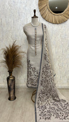 Linen Unstitched Suit Set With Leaf Motifs On Hemline