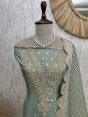 Unstitched Tissue Suit Set Featuring Zari Work On Neckline