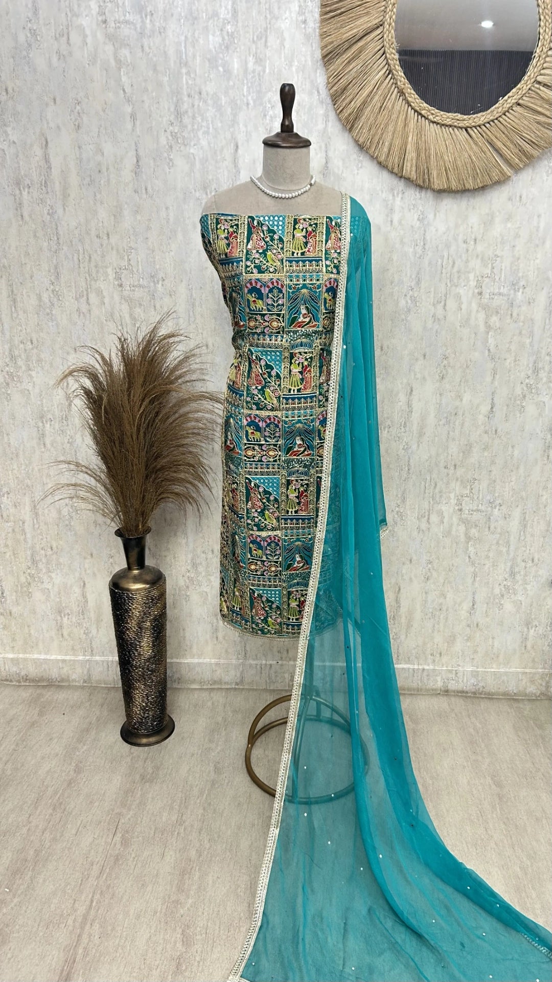 Semi Crepe Unstitched Suit with traditional motifs