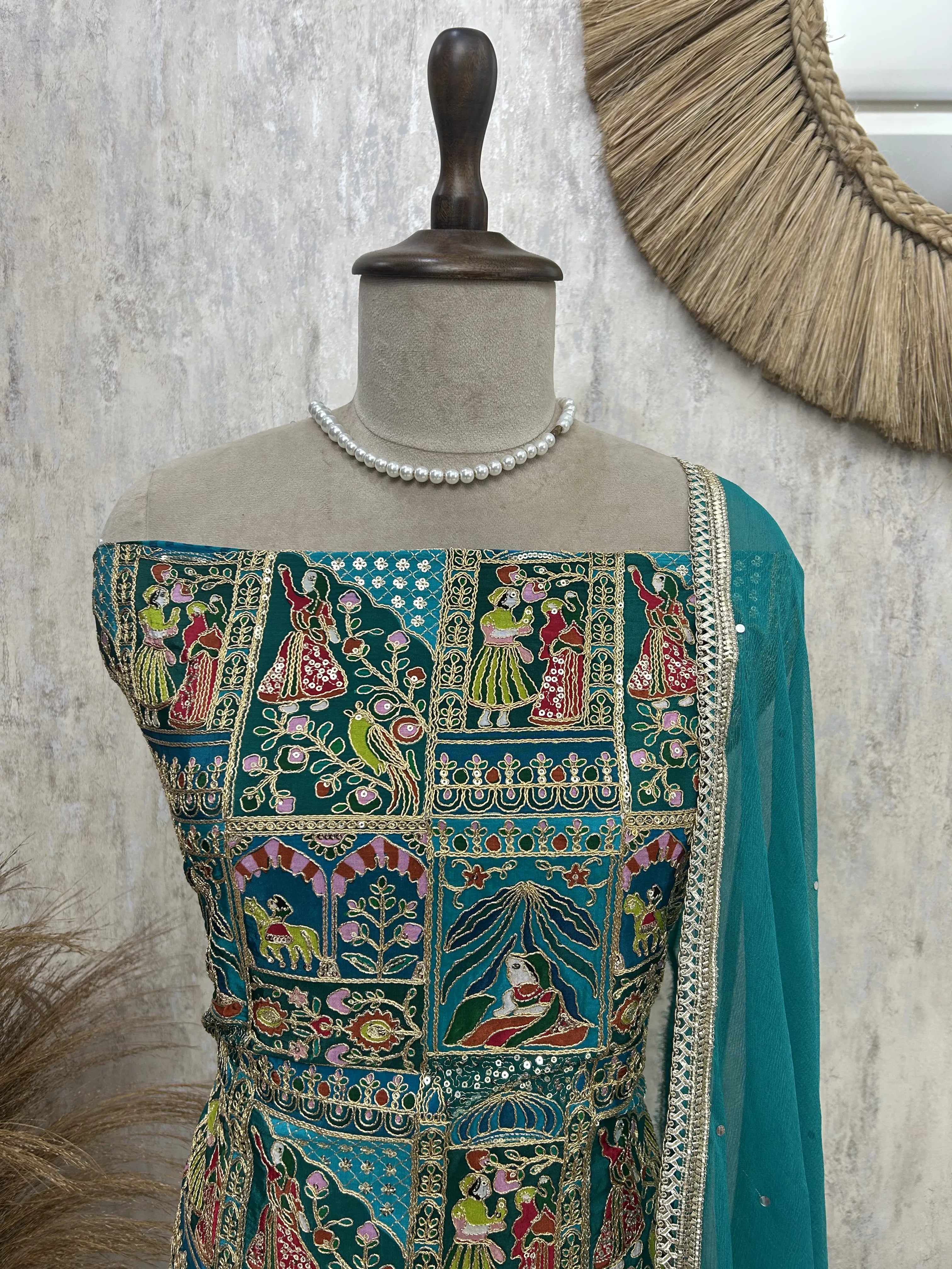 Semi Crepe Unstitched Suit with traditional motifs