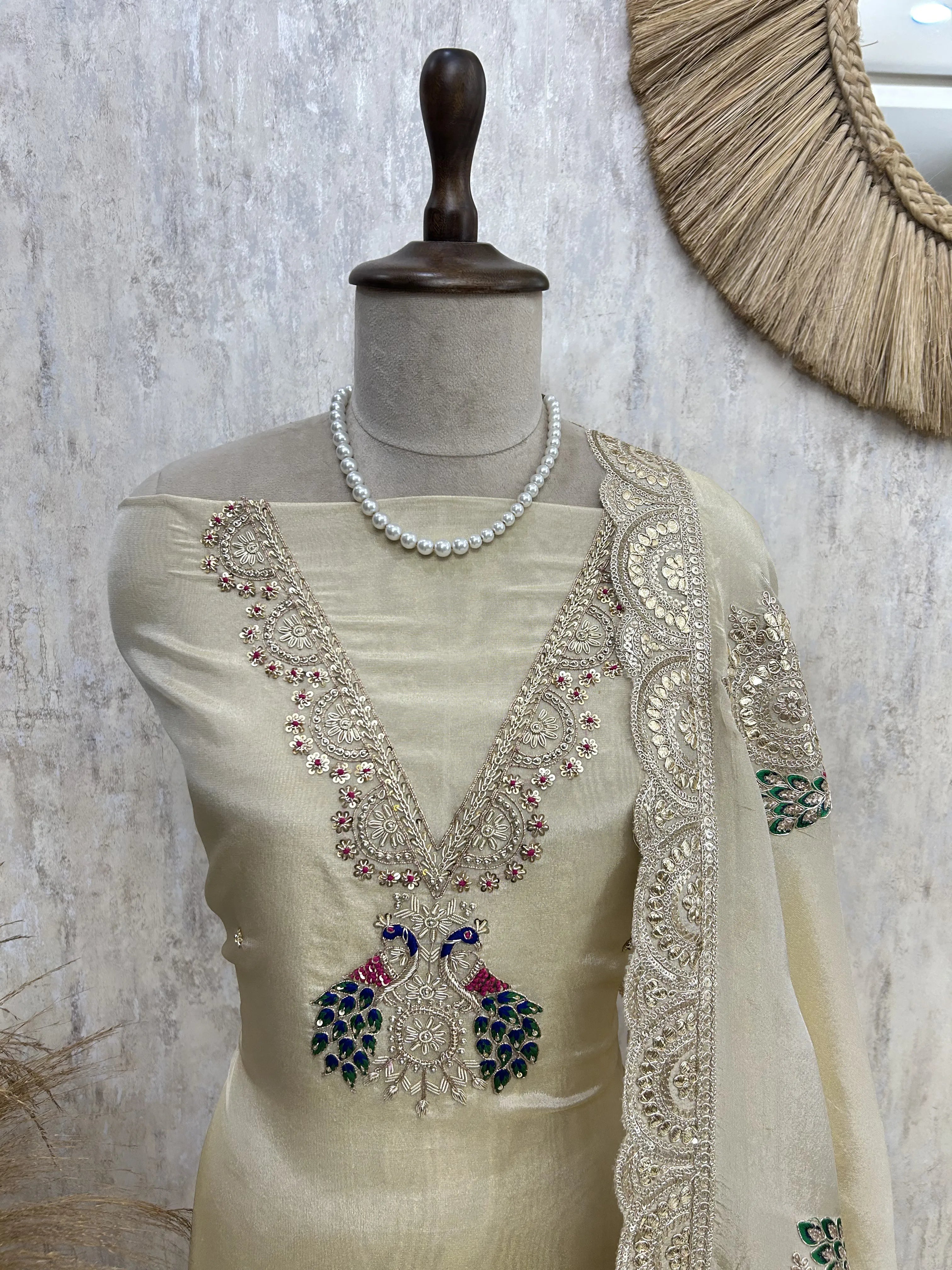 Tissue unstitched suit with peacock motif