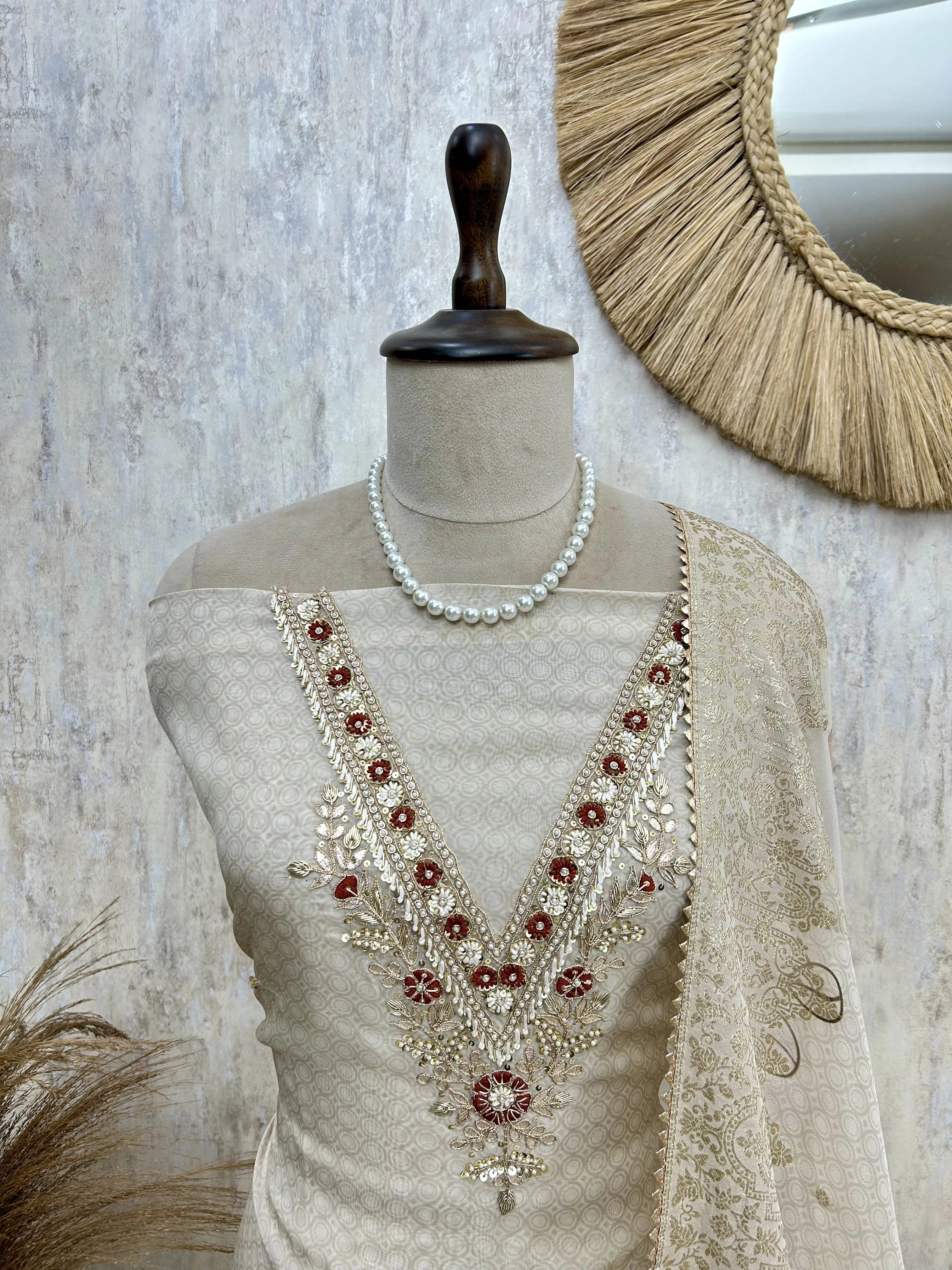 Elegant Embroidered Neckline Unstiched Suit