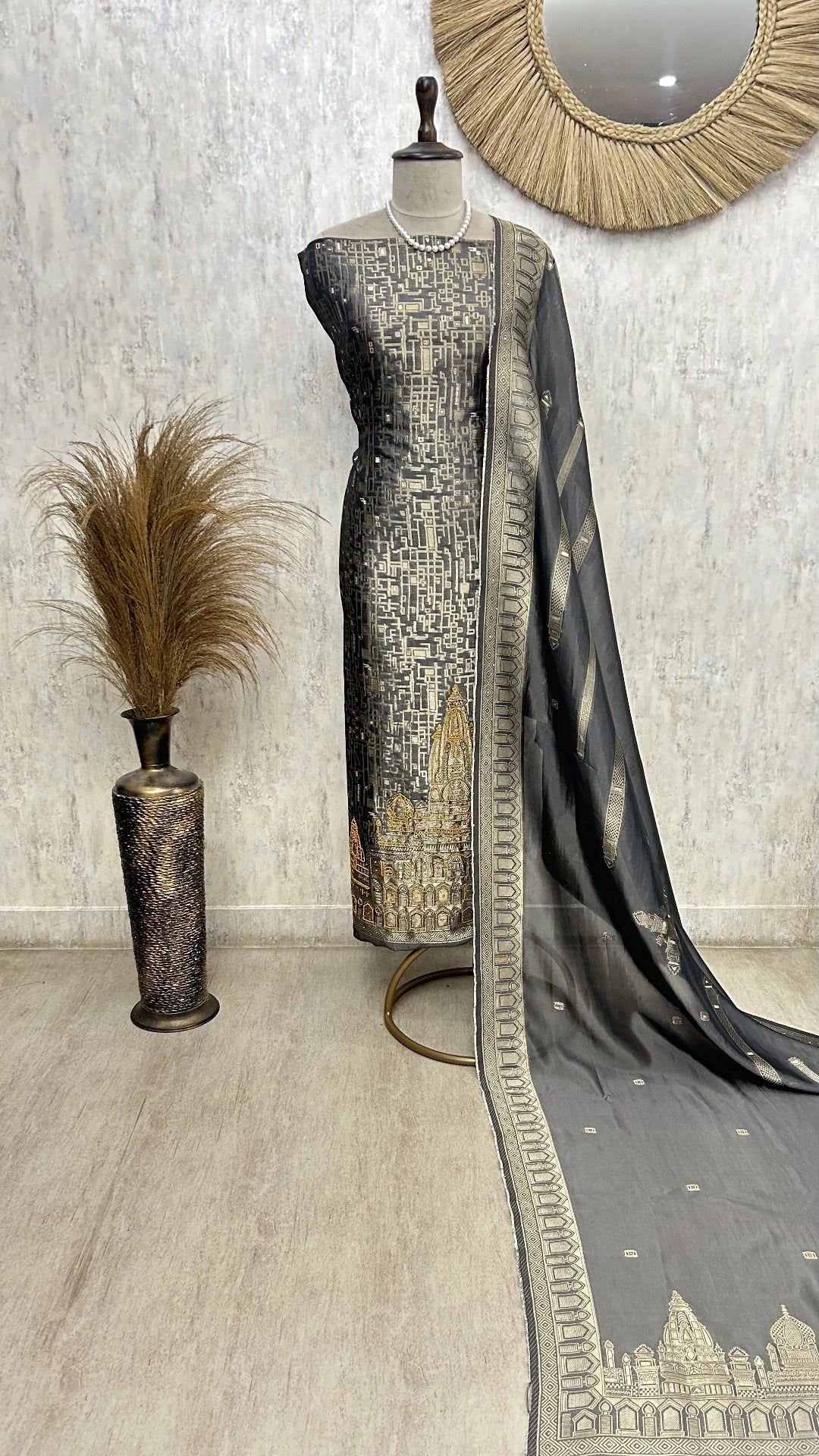 Temple motif zari embroidered unstitched suit