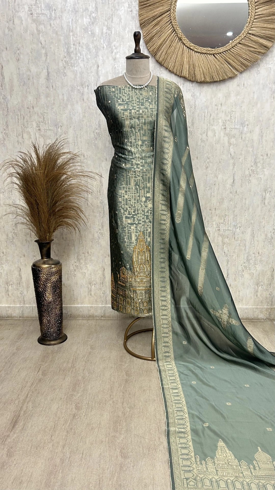 Temple motif zari embroidered unstitched suit