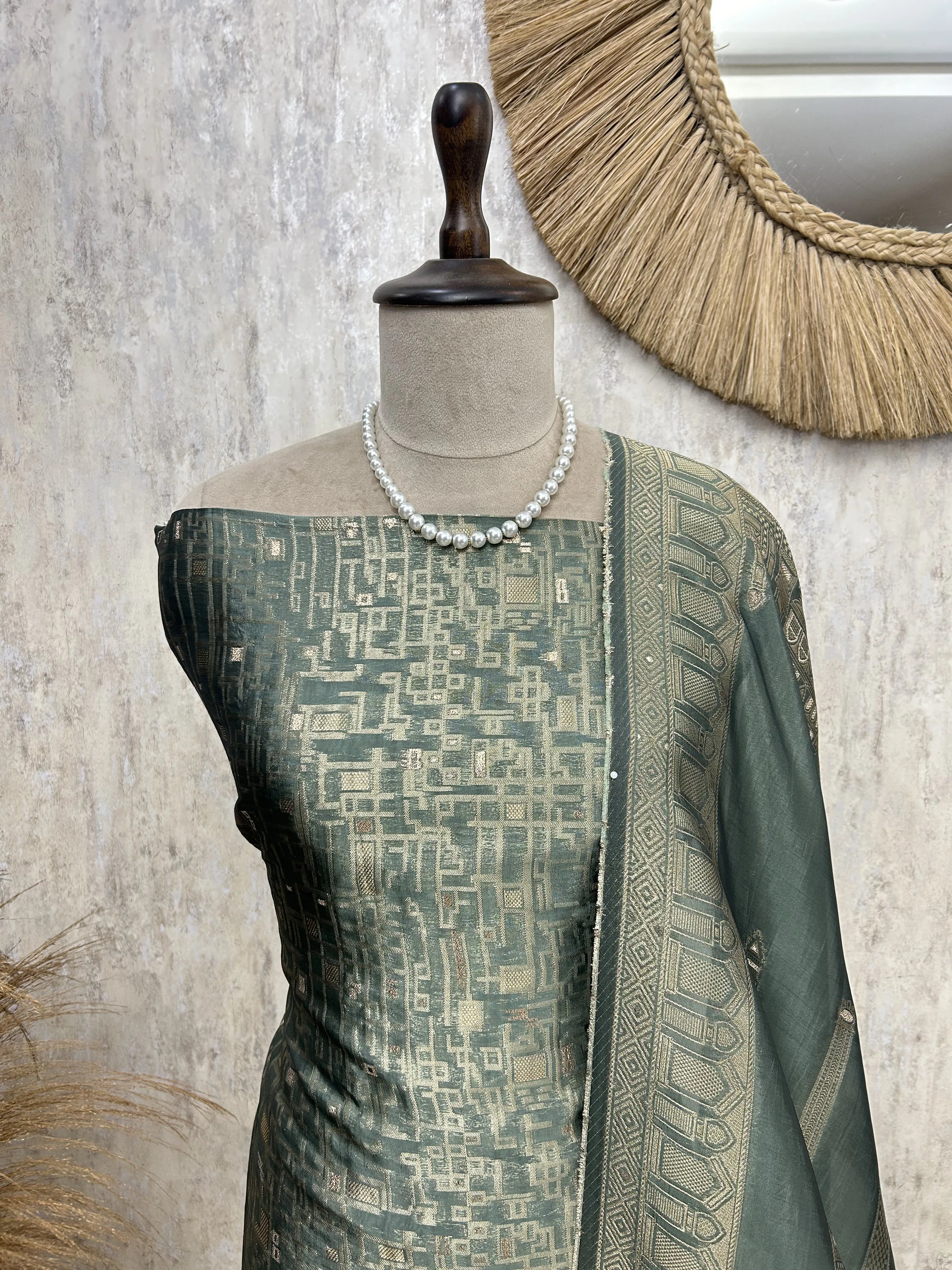 Temple motif zari embroidered unstitched suit