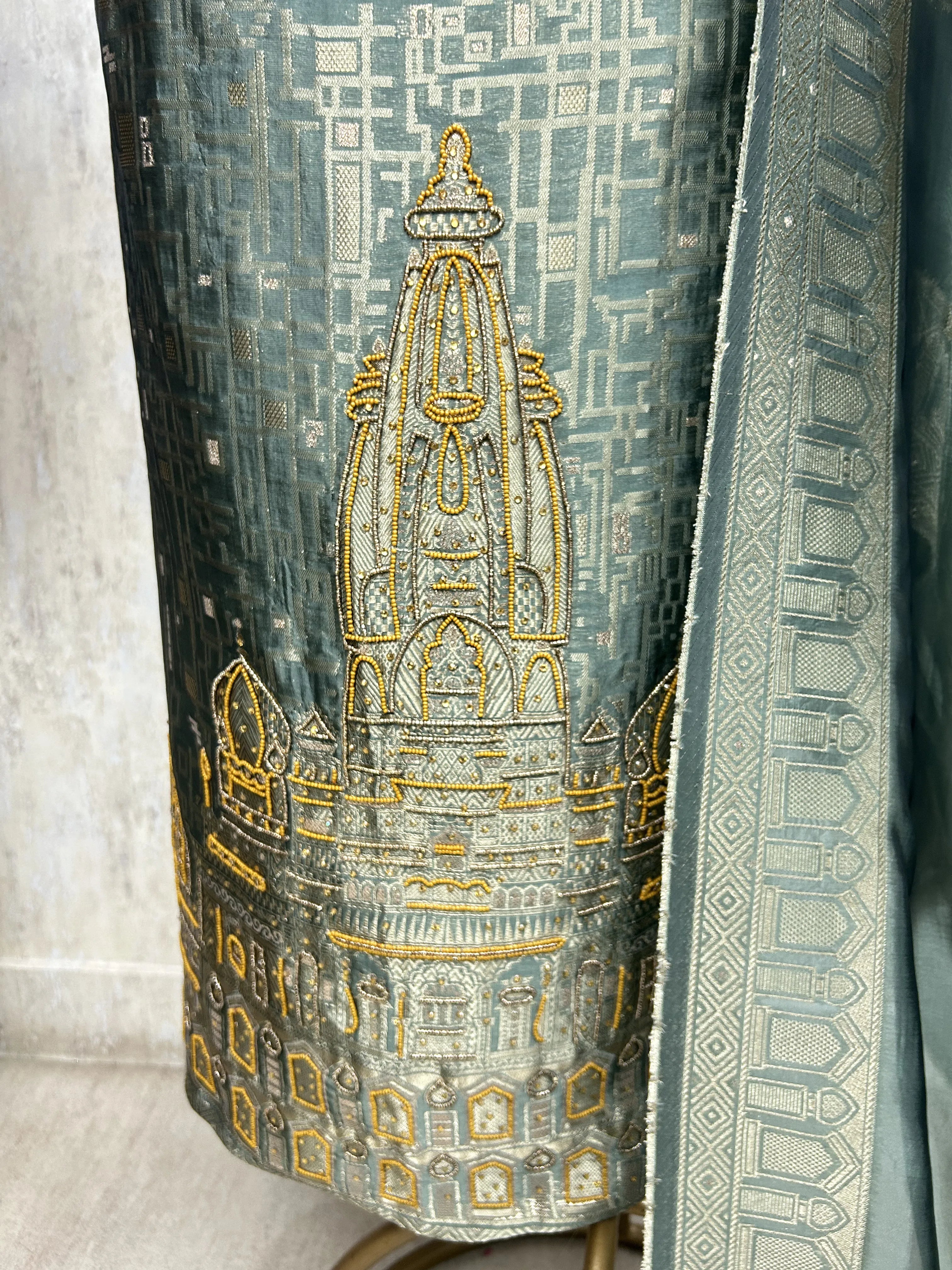 Temple motif zari embroidered unstitched suit