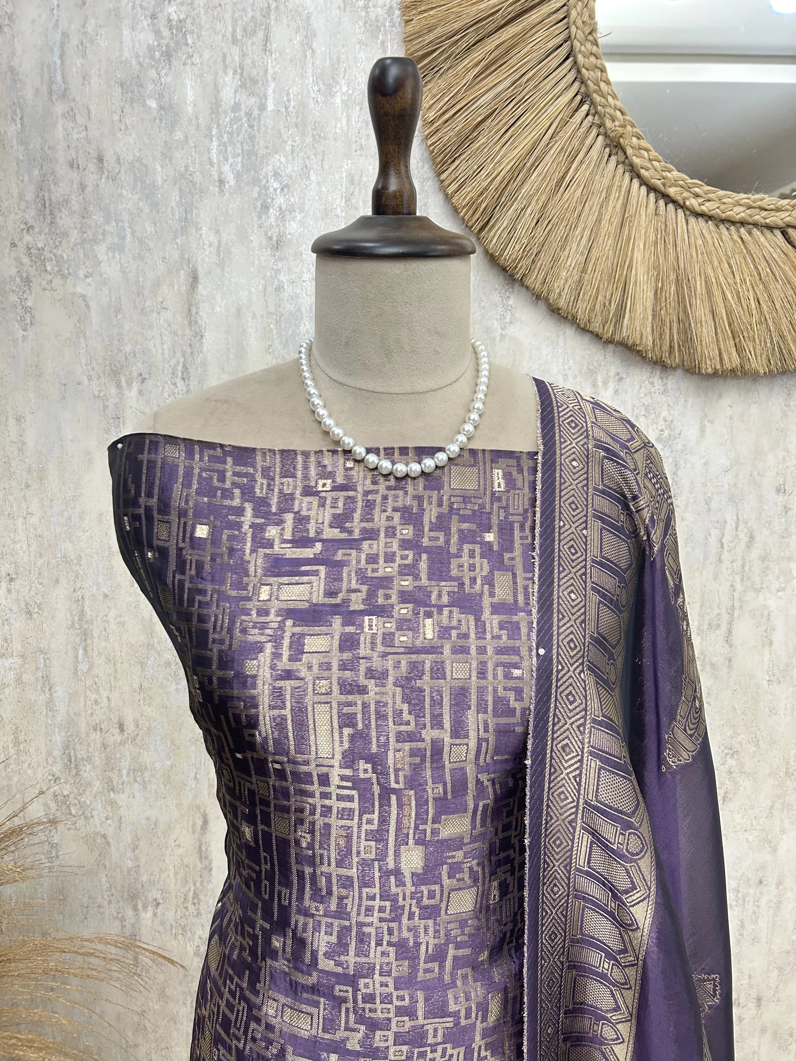 Temple motif zari embroidered unstitched suit
