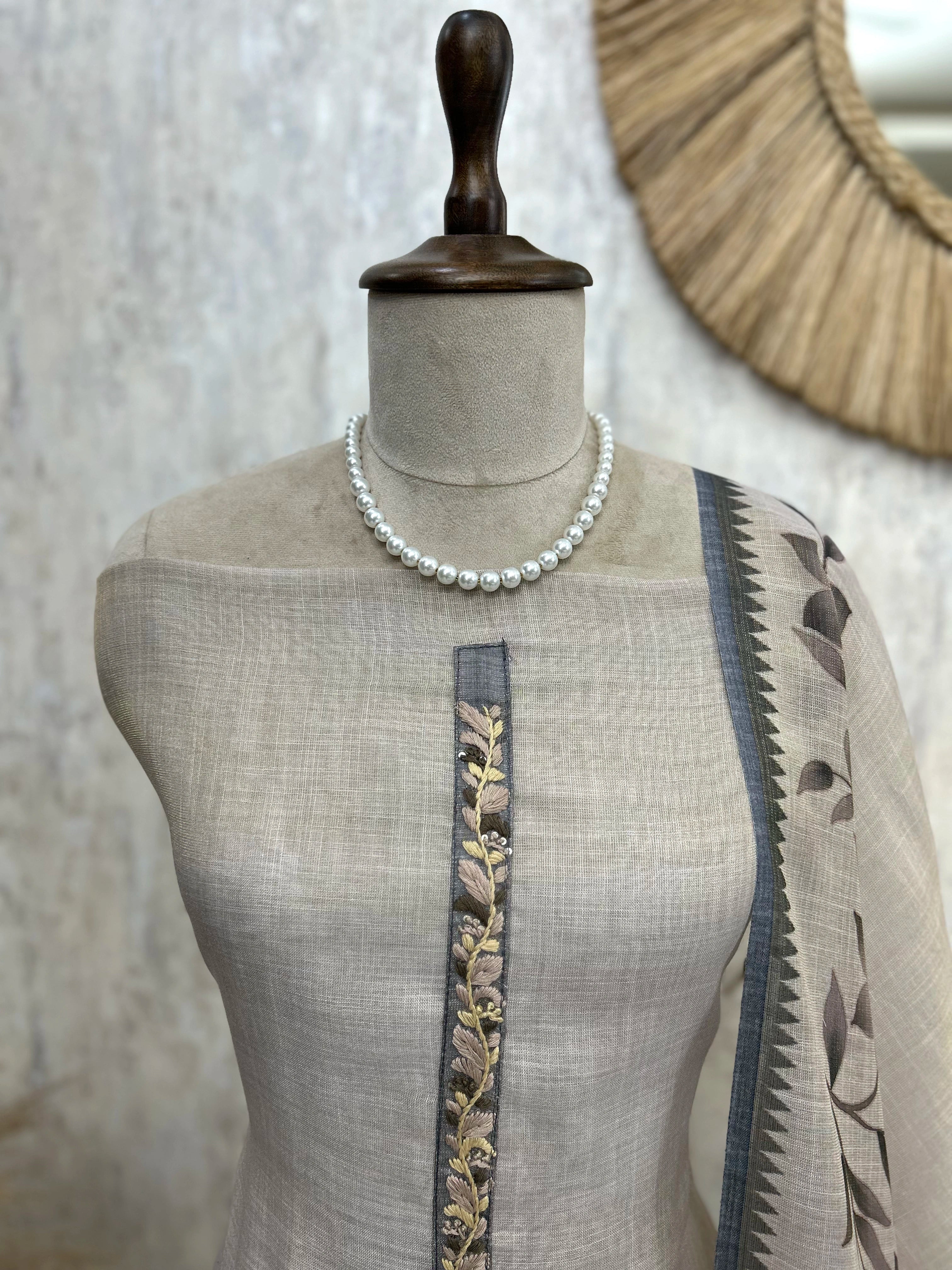Linen Unstitched Suit Set With Leaf Motifs On Hemline