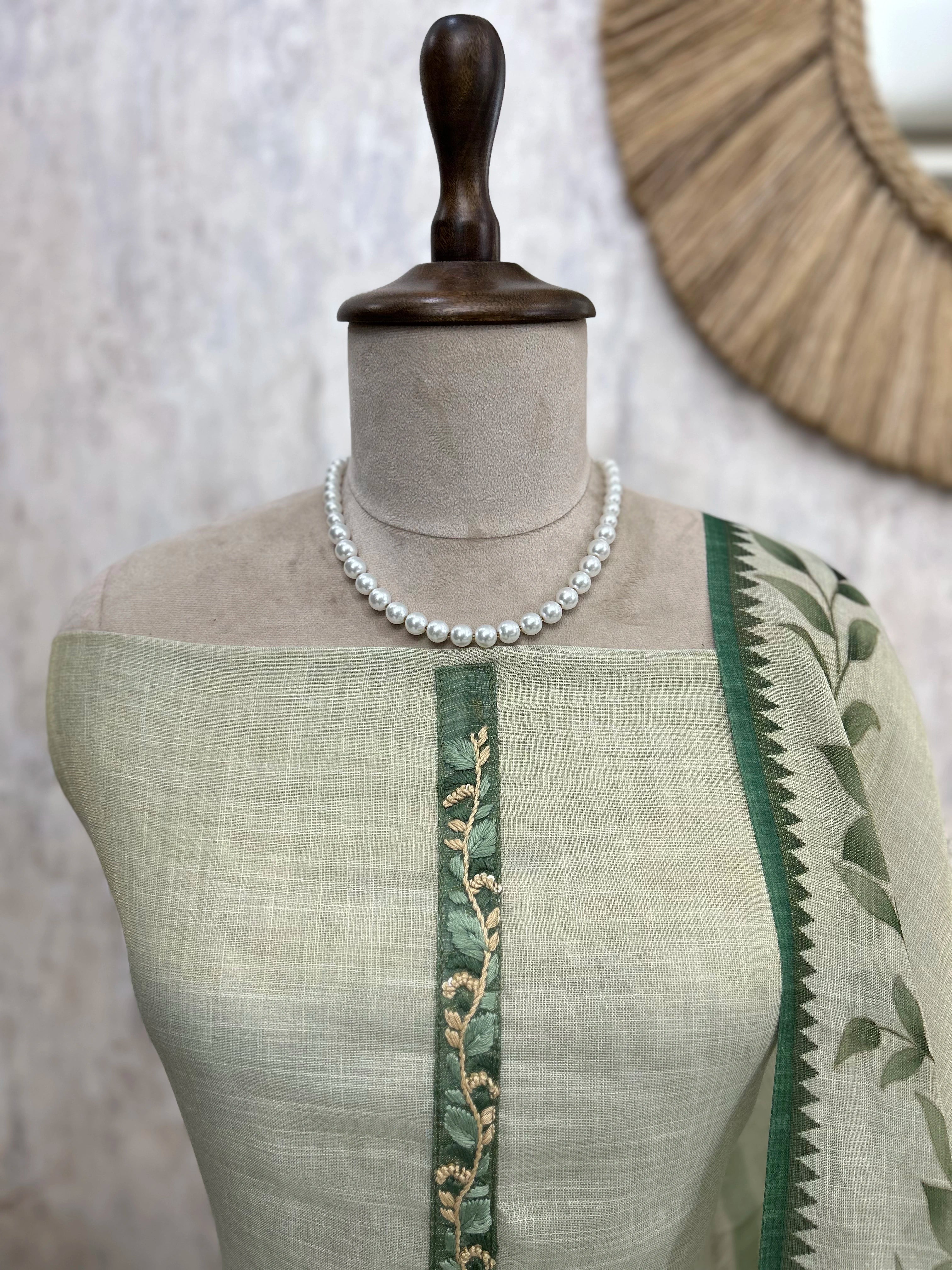 Linen Unstitched Suit Set With Leaf Motifs On Hemline